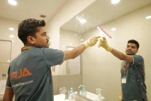 Washroom Cleaning by Urja Facility in Indore